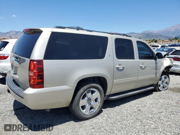 2013 Chevrolet Suburban LT with VIN 1GNSCJE06DR140058, listed as a Copart auction lot 56317995 with 124,345 mi miles and Salvage title. Bid and sale history available at DreamBid. Image 3.