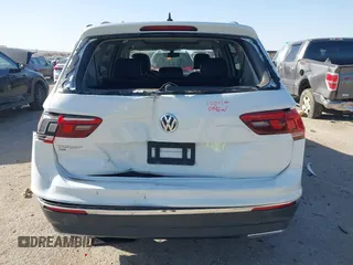 2021 Volkswagen Tiguan SE with VIN 3VV3B7AX9MM051920, listed as a IAAI auction lot 41826721 with 127,699 mi miles and . Bid and sale history available at DreamBid. Image 16.