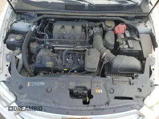 2014 Ford Taurus Limited с VIN 1FAHP2F89EG120939, выставлен на аукционе Copart как лот 59204815 с пробегом 180 105 миль миль и Списание • Salvage title. История ставок и продаж доступна на DreamBid. Изображение 11.