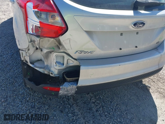 2012 Ford Focus SE with VIN 1FAHP3K27CL333433, listed as a IAAI auction lot 42140452 with 156,048 mi miles and . Bid and sale history available at carsss.com. Image 6.