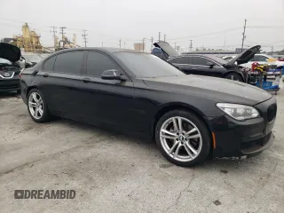 2013 BMW 7 Series 740Li with VIN WBAYE4C51DD137687, listed as a Copart auction lot 76103944 with 134,609 mi miles and Salvage title. Bid and sale history available at DreamBid. Image 4.