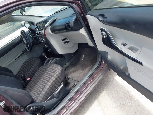 2012 Scion iQ z VIN JTNJJXB02CJ016962, wystawiony jako IAAI lot #42839271 z przebiegiem 126 555 mil mil oraz . Historia ofert i sprzedaży dostępna na DreamBid. Obrazek 5.