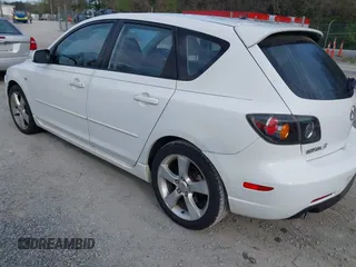 2004 Mazda 3 s with VIN JM1BK143941129870, listed as a IAAI auction lot 42091265 with 198,408 mi miles and . Bid and sale history available at DreamBid. Image 3.