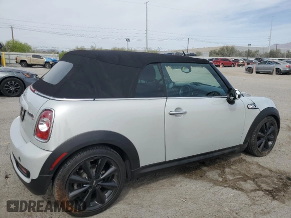 2014 MINI Convertible S with VIN WMWZP3C53ET707205, listed as a Copart auction lot 52179175 with 101,209 mi miles and Salvage Title. Bid and sale history available at DreamBid. Image 3.
