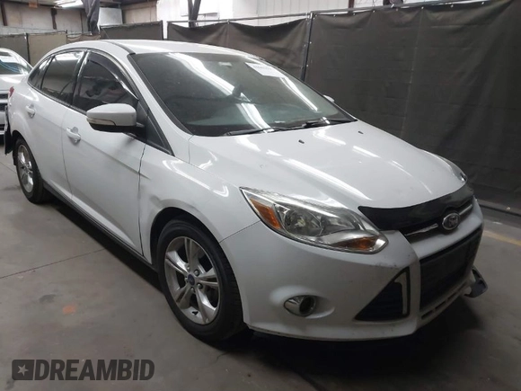 2014 Ford Focus SE with VIN 1FADP3F22EL437727, listed as a IAAI auction lot 42001593 with 90,814 mi miles. Bid and sale history available at carsss.com. Image 1.