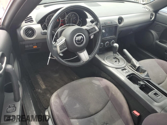2011 Mazda MX-5 Miata Club with VIN JM1NC2MF0B0213167, listed as a Copart auction lot 57776875 with 77,694 mi miles and Salvage title. Bid and sale history available at DreamBid. Image 8.