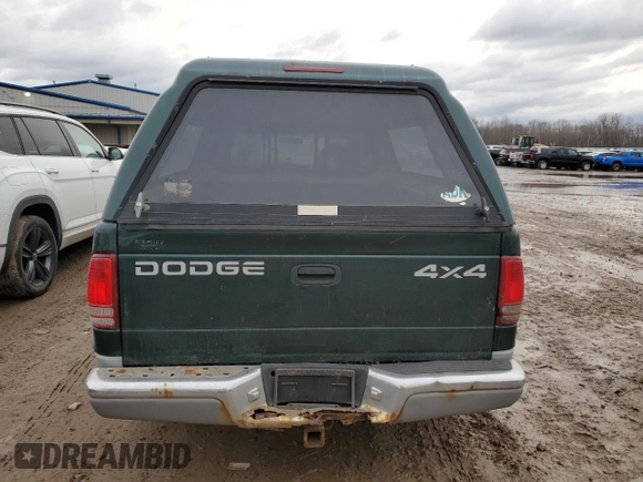 1999 Dodge Dakota SLT with VIN 1B7GG22X4XS309050, listed as a Copart auction lot 82030864 with 141,396 mi miles and Non Repairable. Bid and sale history available at DreamBid. Image 6.