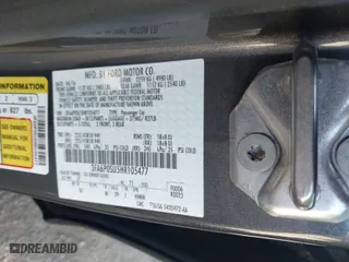 2017 Ford Fusion Energi Titanium with VIN 3FA6P0SU5HR105477, listed as a IAAI auction lot 41072696 with 92,926 mi miles. Bid and sale history available at carsss.com. Image 9.