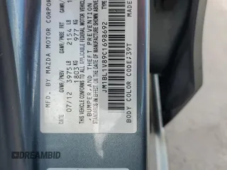 2012 Mazda 3 i Touring with VIN JM1BL1V89C1698692, listed as a Copart auction lot 61723555 with 112,065 mi miles and Clean title. Bid and sale history available at DreamBid. Image 12.