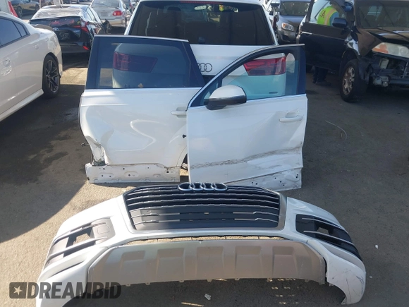 2019 Audi Q7 Premium with VIN WA1AAAF70KD037387, listed as a IAAI auction lot 41966996 with 93,245 mi miles and . Bid and sale history available at DreamBid. Image 12.
