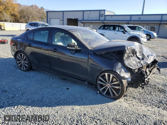 2017 Jaguar XE 35t Prestige with VIN SAJAK4BVXHA974414, listed as a Copart auction lot 83154954 with 98,913 mi miles and Salvage Title. Bid and sale history available at carsss.com. Image 4.