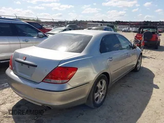 2007 Acura RL Tech Pkg with VIN JH4KB16647C004578, listed as a IAAI auction lot 42062919 with 162,968 mi miles. Bid and sale history available at carsss.com. Image 4.