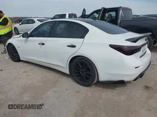 2015 Infiniti Q50 z VIN JN1BV7APXFM335981, wystawiony jako IAAI lot #41718555 z przebiegiem 83 918 mil mil oraz . Historia ofert i sprzedaży dostępna na DreamBid. Obrazek 3.