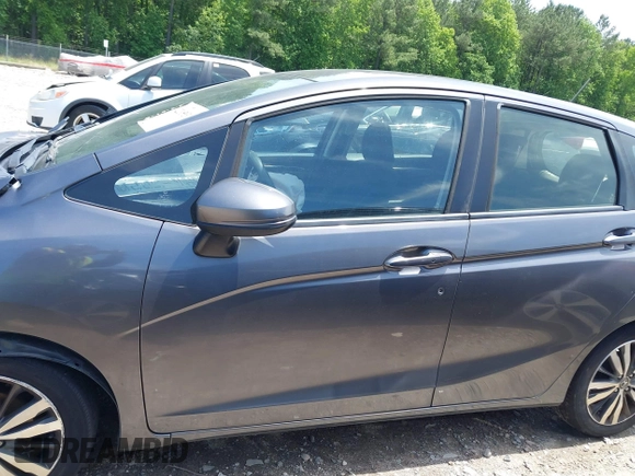 2016 Honda Fit EX z VIN JHMGK5H73GX031816, wystawiony jako IAAI lot #42295931 z przebiegiem Nie podano mil oraz . Historia ofert i sprzedaży dostępna na DreamBid. Obrazek 15.