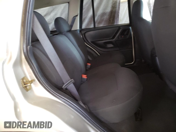 2004 Jeep Grand Cherokee Laredo z VIN 1J4GW48S24C327184, wystawiony jako Copart lot #53702515 z przebiegiem 151 411 mil mil oraz Czysty tytuł • Clean title. Historia ofert i sprzedaży dostępna na DreamBid. Obrazek 11.