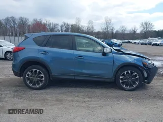 2016 Mazda CX-5 Grand Touring with VIN JM3KE4DY0G0629924, listed as a IAAI auction lot 41878154 with 78,196 mi miles. Bid and sale history available at carsss.com. Image 13.