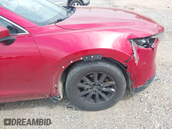 2016 Mazda CX-9 Touring z VIN JM3TCACY0G0101617, wystawiony jako IAAI lot #41850485 z przebiegiem 292 880 mil mil oraz . Historia ofert i sprzedaży dostępna na DreamBid. Obrazek 19.