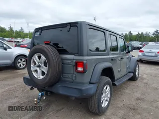 2020 Jeep Wrangler Unlimited Black and Tan with VIN 1C4HJXDG5LW187222, listed as a IAAI auction lot 42238194 with 9,237 mi miles and . Bid and sale history available at DreamBid. Image 4.