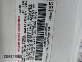 1997 Mitsubishi Mirage LS z VIN JA3AY31C1VU009019, wystawiony jako Copart lot #74227544 z przebiegiem 243 967 mil mil oraz Szkoda całkowita • Salvage title. Historia ofert i sprzedaży dostępna na DreamBid. Obrazek 12.