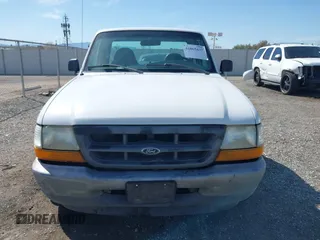 1999 Ford Ranger XL with VIN 1FTYR10C0XUA36539, listed as a IAAI auction lot 41865437 with 246,810 mi miles. Bid and sale history available at carsss.com. Image 6.