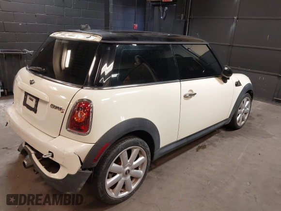 2010 MINI Hardtop S with VIN WMWMF7C5XATX41382, listed as a IAAI auction lot 40558359 with 96,158 mi miles and . Bid and sale history available at DreamBid. Image 4.