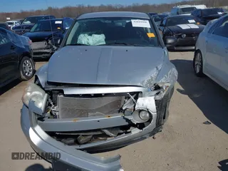 2011 Dodge Caliber Mainstreet with VIN 1B3CB3HA9BD295750, listed as a IAAI auction lot 42049996 with Not Provided miles. Bid and sale history available at carsss.com. Image 12.