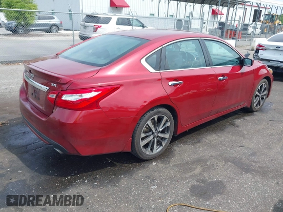 2016 Nissan Altima SL with VIN 1N4AL3AP1GC264898, listed as a IAAI auction lot 42093306 with 115,429 mi miles and . Bid and sale history available at carsss.com. Image 4.