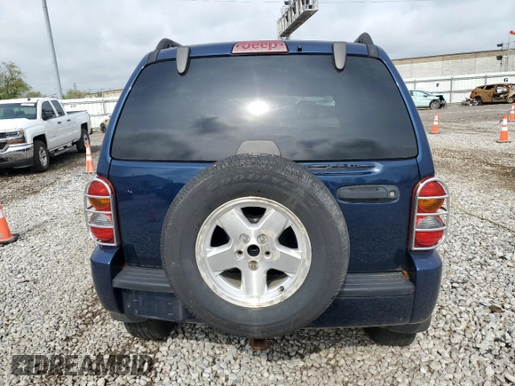 2002 Jeep Liberty Limited with VIN 1J4GL58K52W213948, listed as a Copart auction lot 60555885 with 96,415 mi miles and Salvage title. Bid and sale history available at DreamBid. Image 6.
