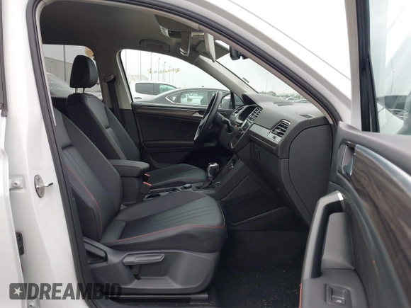 2024 Volkswagen Tiguan Wolfsburg Edition with VIN 3VV5B7AXXRM233917, listed as a IAAI auction lot 42780573 with 11,983 mi miles and . Bid and sale history available at DreamBid. Image 5.