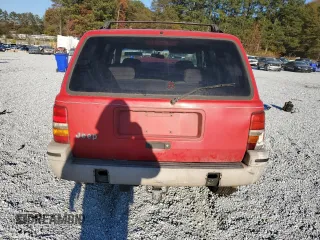 1995 Jeep Grand Cherokee Laredo with VIN 1J4GZ58S7SC747906, listed as a Copart auction lot 82529374 with 73,932 mi miles and Salvage Title. Bid and sale history available at carsss.com. Image 6.