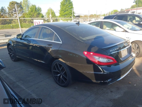 2012 Mercedes-Benz CLS-Class CLS 550 with VIN WDDLJ7DB9CA018502, listed as a IAAI auction lot 42051316 with 218,404 mi miles. Bid and sale history available at carsss.com. Image 14.