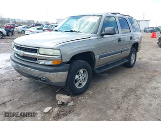 2003 Chevrolet Tahoe LT with VIN 1GNEC13Z63J100509, listed as a IAAI auction lot 42013681 with 1 mi miles. Bid and sale history available at carsss.com. Image 2.