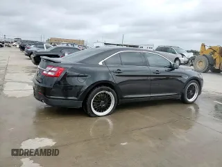 2014 Ford Taurus SHO z VIN 1FAHP2KT4EG106957, wystawiony jako Copart lot #59364185 z przebiegiem 113 704 mil mil oraz Szkoda całkowita • Salvage title. Historia ofert i sprzedaży dostępna na DreamBid. Obrazek 13.