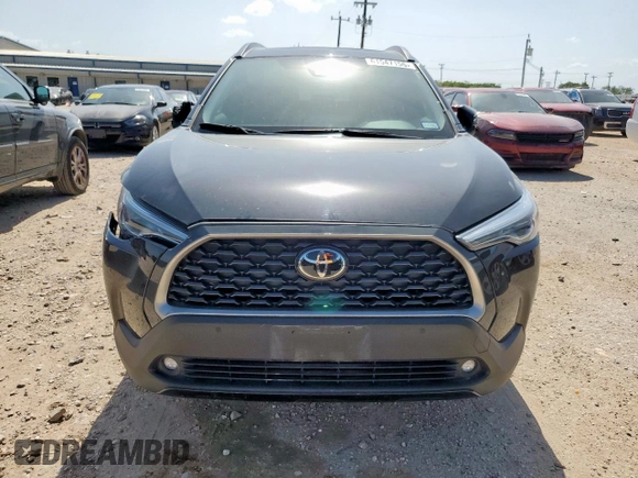 2023 Toyota Corolla Cross XLE with VIN 7MUDAAAG2PV072301, listed as a Copart auction lot 61547155 with 25,017 mi miles and Salvage title. Bid and sale history available at DreamBid. Image 5.