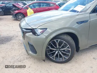 2025 Mazda CX-70 S Premium с VIN JM3KJDHCXS1113115, выставлен на аукционе IAAI как лот 42179954 с пробегом 5 758 миль миль и . История ставок и продаж доступна на DreamBid. Изображение 6.