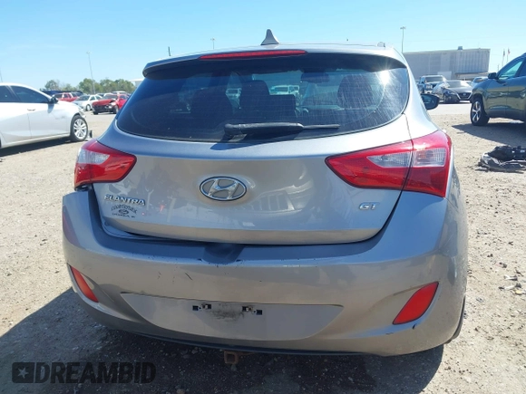 2013 Hyundai Elantra GT with VIN KMHD35LE4DU078269, listed as a IAAI auction lot 41811795 with 116,458 mi miles. Bid and sale history available at carsss.com. Image 16.