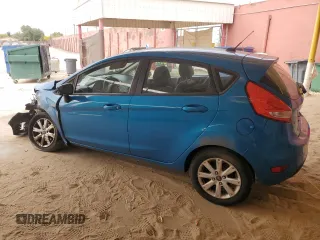 2013 Ford Fiesta SE z VIN 3FADP4EJ7DM216071, wystawiony jako Copart lot #58629155 z przebiegiem 73 407 mil mil oraz Szkoda całkowita • Salvage title. Historia ofert i sprzedaży dostępna na DreamBid. Obrazek 2.