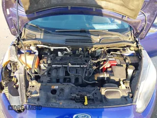 2014 Ford Fiesta SE z VIN 3FADP4BJ5EM243551, wystawiony jako IAAI lot #41919239 z przebiegiem 92 396 mil mil oraz . Historia ofert i sprzedaży dostępna na DreamBid. Obrazek 10.
