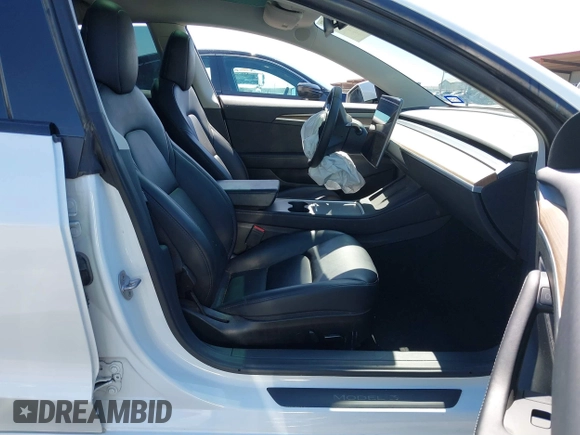 2023 Tesla Model 3 z VIN 5YJ3E1EA0PF608506, wystawiony jako IAAI lot #41748862 z przebiegiem 15 mil mil oraz . Historia ofert i sprzedaży dostępna na DreamBid. Obrazek 5.