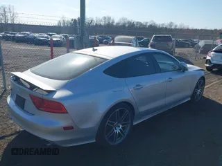 2014 Audi S7 Prestige with VIN WAUW2AFC6EN140766, listed as a IAAI auction lot 41780769 with 101,318 mi miles. Bid and sale history available at carsss.com. Image 4.