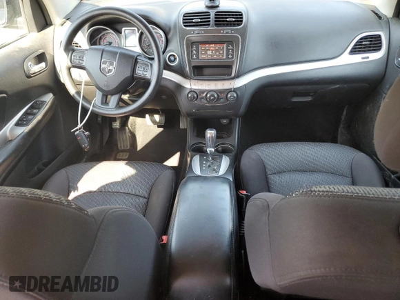 2013 Dodge Journey SXT with VIN 3C4PDCBGXDT630423, listed as a Copart auction lot 62359685 with 151,653 mi miles and Salvage title. Bid and sale history available at DreamBid. Image 8.