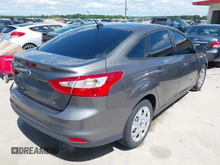 2012 Ford Focus SE with VIN 1FAHP3F28CL211898, listed as a IAAI auction lot 42466544 with 142,933 mi miles and . Bid and sale history available at DreamBid. Image 4.