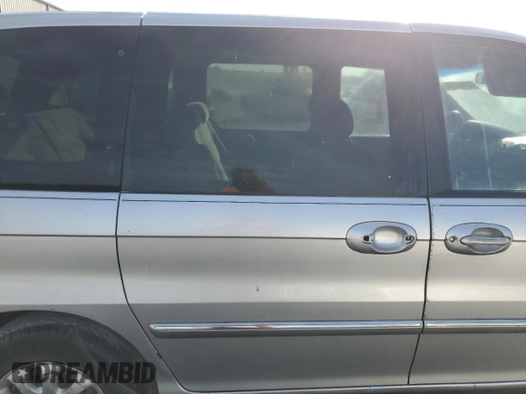 2005 Kia Sedona LX with VIN KNDUP132356769452, listed as a Copart auction lot 82835494 with 93,845 mi miles and Salvage Title. Bid and sale history available at carsss.com. Image 11.