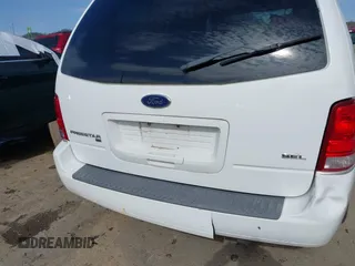 2006 Ford Freestar SEL z VIN 2FMZA52276BA05540, wystawiony jako IAAI lot #42001101 z przebiegiem Nie podano mil oraz . Historia ofert i sprzedaży dostępna na DreamBid. Obrazek 6.