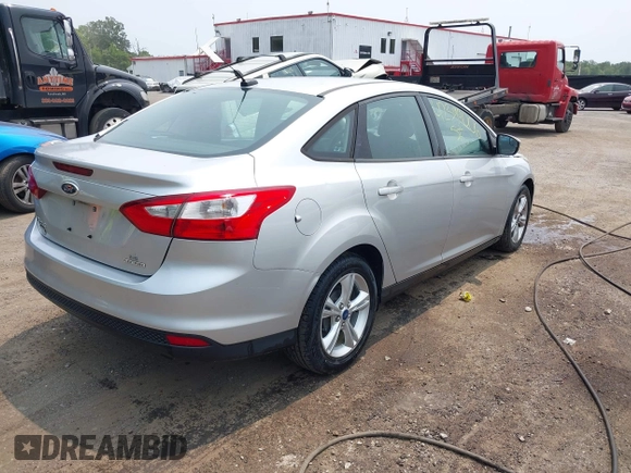 2013 Ford Focus SE with VIN 1FADP3F28DL208516, listed as a IAAI auction lot 42399006 with 103,869 mi miles and . Bid and sale history available at DreamBid. Image 4.