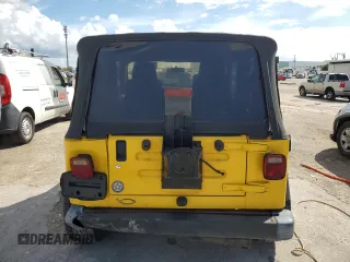 2003 Jeep Wrangler X with VIN 1J4FA39S83P368090, listed as a Copart auction lot 69773284 with 216,671 mi miles and Salvage Title. Bid and sale history available at carsss.com. Image 6.