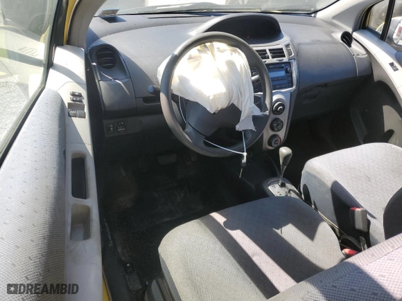 2009 Toyota Yaris with VIN JTDJT903195276164, listed as a Copart auction lot 50129115 with 165,824 mi miles and Salvage Title. Bid and sale history available at carsss.com. Image 8.