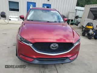 2019 Mazda CX-5 Grand Touring with VIN JM3KFADM2K1657915, listed as a Copart auction lot 56647145 with 85,095 mi miles and Salvage title. Bid and sale history available at DreamBid. Image 5.