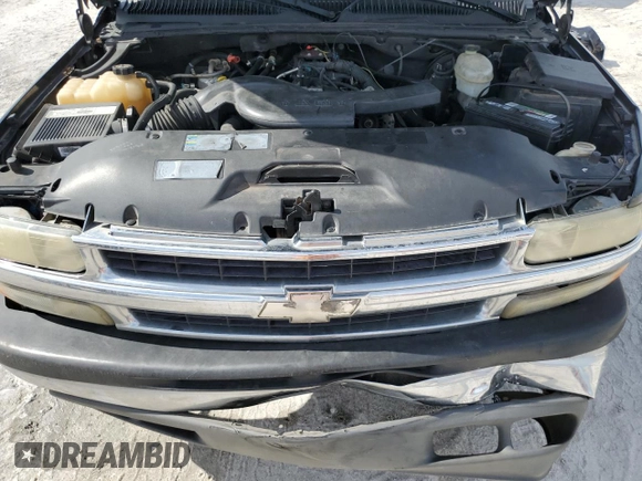 2003 Chevrolet Suburban LT z VIN 1GNEC16Z23J338840, wystawiony jako Copart lot #59962715 z przebiegiem 264 250 mil mil oraz Szkoda całkowita • Salvage title. Historia ofert i sprzedaży dostępna na DreamBid. Obrazek 12.