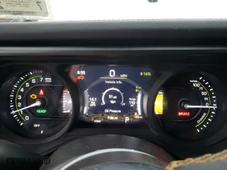 2024 Jeep Wrangler 4xe Sahara with VIN 1C4RJXP69RW162663, listed as a Copart auction lot 50141385 with 7,156 mi miles and Salvage Title. Bid and sale history available at carsss.com. Image 9.